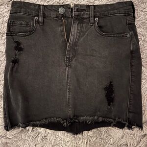 Black distressed Jean skirt. Size 2